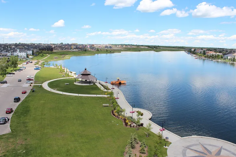 Aerial view of John Peake Park and its gazebo on the shore of Chestermere Lake in Chestermere, Alberta.